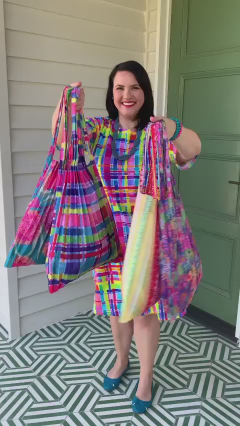 Load and play video in Gallery viewer, Concertina Pleat Tote Bag - Gum Blossoms