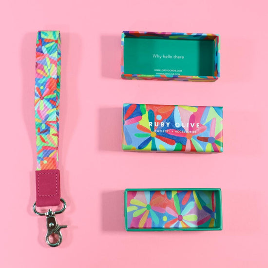 Load image into Gallery viewer, RAINBOW DAISIES Wrist Lanyard - Ruby Olive X Mrs Edgar X Lordy Dordie COLLAB
